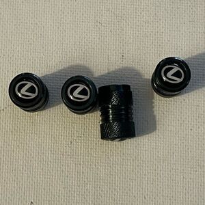 Lexus logo valve Stem caps in Black set of 4. NWT